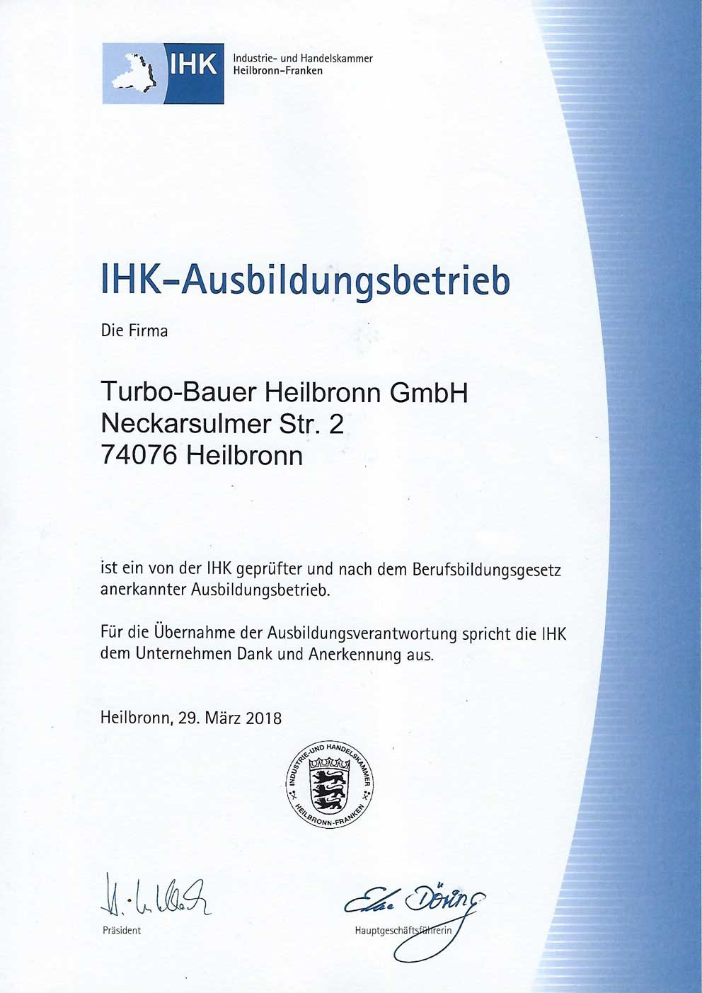 Zwei Kfz-Mechatroniker bei der Fahrzeugprüfung – Jobs und Karriere bei Turbo-Bauer